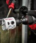 Polycarbonate Door Lock And Deadbolt Installation Kit with ice hardened hole saw attached to drill