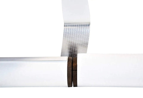 Close-up of Fiberglass Pipe Insulation 2 Inch By 1 Inch Pack Of 10 Preformed Thermal Insulation with White ASJ jacket showing cross-section.