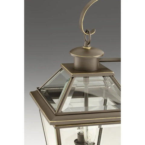 Close-up of Burlington Two Light Wall Lantern in oil rubbed bronze finish with beveled glass panes and durable metal construction.