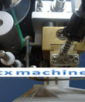Close-up of High Speed Round Bottle Labeling Machine Plus Slick Date Printer components and adjustments.