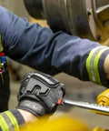 Person using tools wearing Winter Ready Insulated Work Gloves With Impact Protection, X Large, Black And Grey, in a work setting
