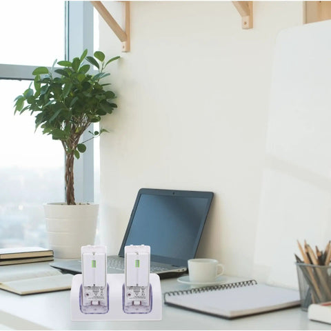 Dual Slot USB Rechargeable Battery Charging Dock for Game Controllers, white ABS, on a stylish desk setup.