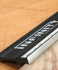 Close-up of 46 Inch Aluminum Precision Straight Edge for CNC and Shop Use, showing machined flat edge with adhesive rule recess.