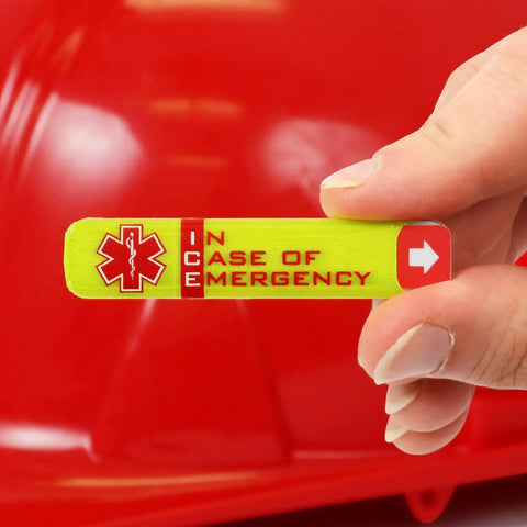 Person holding Emergency Worker Hard Hat Reflective ID Sticker Set 0.5 X 2.75 Inches Fluorescent Lime Yellow And Red