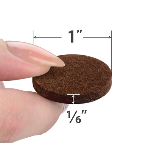 Close-up of a brown felt pad from the 48 Pack Felt Furniture Pads For Chair Legs That Glide Quietly And Protect Your Floors Premium Floor Protectors For Hardwood Wood Laminate And Tile Prevent Scratches Scuffs And Damage Brown Finish, showing its 1-inch diameter and 1/6 inch thickness