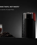 Electric Blade Coffee Grinder For Fresh Grounds In Minutes Fast And Quiet Easy To Clean Black Finish on counter next to beans