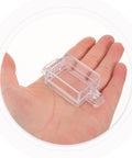 Clear Rocker Switch Cover Emergency Guard for Industrial and Marine Use 2.48 X 1.18 X 0.78 Inch shown in hand for size reference.