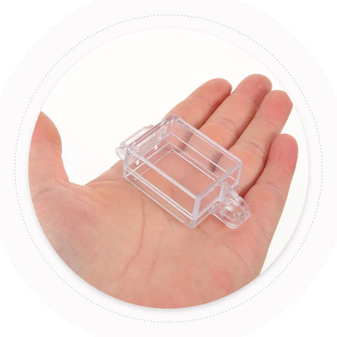 Clear Rocker Switch Cover Emergency Guard for Industrial and Marine Use 2.48 X 1.18 X 0.78 Inch shown in hand for size reference.