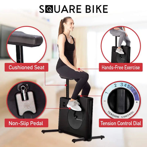Woman using Felicity Compact Under Desk Exercise Bike With 8 Level Magnetic Resistance, showing cushioned seat and tension dial.