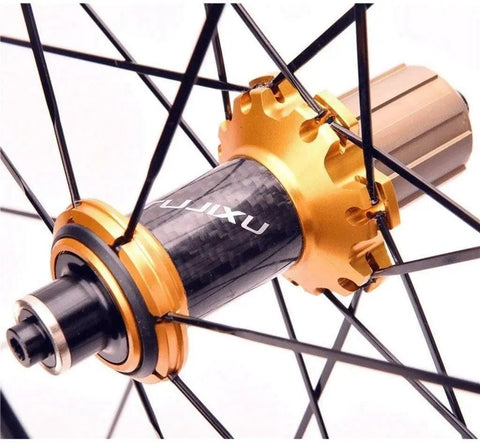 Close-up of hub on Beefy Lightweight 700C Road Bike Wheelset With Double Wall Aluminum Rims 40mm Rim Height, black and gold detail.