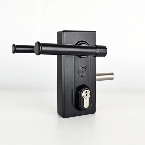 Badass Stainless Steel Gate Lock With Adjustable Deadbolt And Three Keys For Heavy Duty Fence Security Built Tough For Daily Outdoor Use On Wood Or Metal Gates, close-up view showing keyhole and handle.