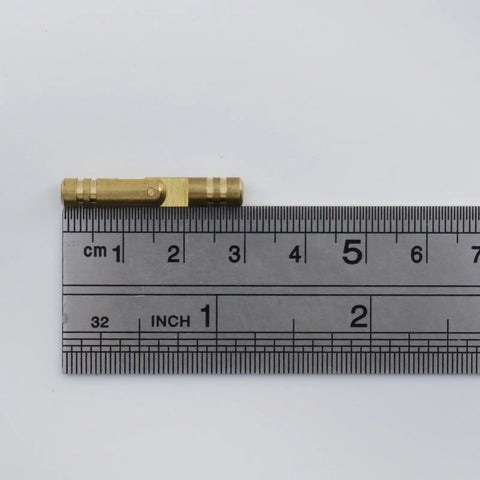 Slick Hidden Barrel Hinges 5x30mm Brass Box Hinges with ruler for scale, gold finish, suitable for small and jewelry boxes.