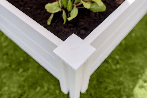 Corner view of White Vinyl Raised Garden Bed 4 Ft By 4 Ft By 11 In Deep, Modular PVC Construction, BPA And Phthalate Free