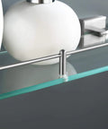 Close-up of Stainless Steel Glass Bathroom Shelf 1 Tier Wall Mount Brushed Finish Rustproof, 6mm Tempered Clear Glass with modern decor items.