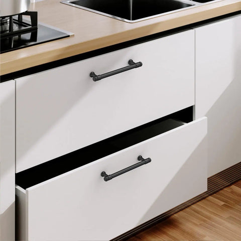 10 Pack 5 Inch Matte Black Cabinet Pulls Featuring Ultra Chic Rust Resistant Zinc Alloy Build For A Certified Top Shelf Kitchen Reno Upgrade That Drops Major Style On Every Drawer And Cupboard Space mounted on white kitchen drawers.