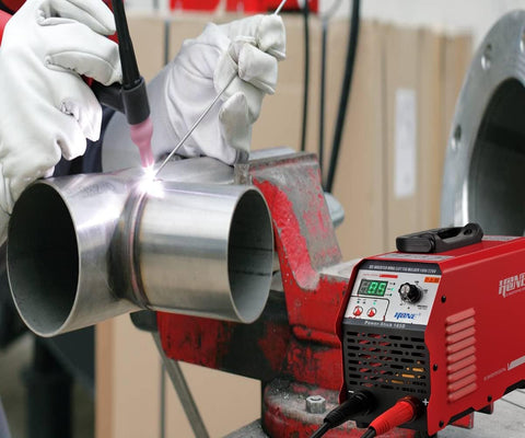 Heavy Duty Arc Welder With Lift TIG Function And Digital IGBT Inverter Beefed Up Duty Cycle Boosted To Forty Percent 185 Amp At 220V 130 Amp At 110V Real Power For One Sixteenth To Five Thirty Second Weld Rods VRD Anti Stick Hot Start Arc Force welding stainless steel pipe in workshop
