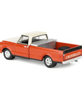 Rear side view of Red 1/64 Scale 1968 Chevrolet C10 Pickup With Toolbox Diecast Truck From Down On The Farm Series 11, rubber wheels visible