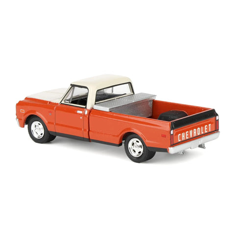 Rear side view of Red 1/64 Scale 1968 Chevrolet C10 Pickup With Toolbox Diecast Truck From Down On The Farm Series 11, rubber wheels visible