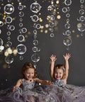 White Bubble Garland Set 26.4 Feet Of Transparent PVC Bubbles For Mermaid Ocean Party Decor with children playing underneath
