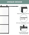 Clear Tempered Glass Barn Door 28 Inch By 84 Inch With Carbon Steel Frame Pre Drilled For Easy Assembly Including 5 Foot Hardware Kit And Soft Close System For Smooth Sliding And Modern Interior Spaces. Front view showing frame and hardware.