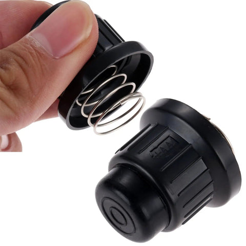 Close-up of Three Pack AA Battery Push Button Igniter Caps Replacement for Tabletop Griddles Gas Fire Pits and Patio Heaters.
