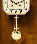 Wall Clock Pendulum Replacement 5.51 X 2.28 X 1.18 Inch Mechanical Clock Part for DIY Repair and Home Decor on wooden background