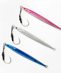 High Impact Saltwater Fishing Jigs For Speed Jigging With Barbed Hooks And Solid Lead Core in silver, blue, and pink colors.