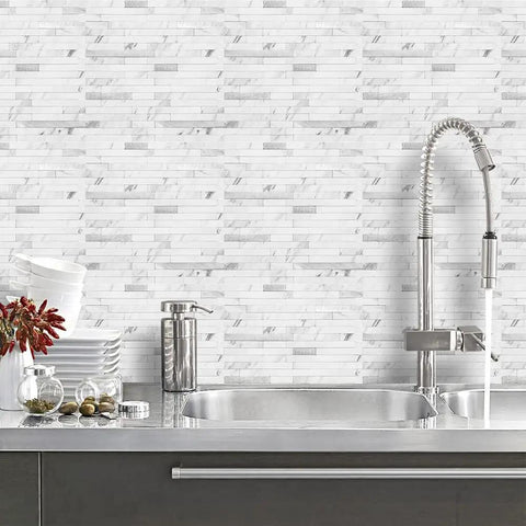 10 Sheet Peel And Stick Backsplash Tile With Faux White Marble Look In PVC Mixed Metal Finish for Kitchen And Bathroom on kitchen wall