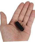 Hand holding black rubber steam wand safety guard for coffee machines