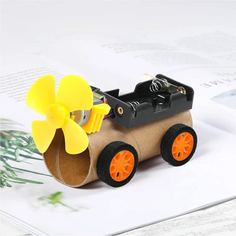 DIY car model from 276 Piece DC Motor Kit For DIY Science Projects With Motors LED Light Vanes Propellers Battery Holder Plastic Gears Switches