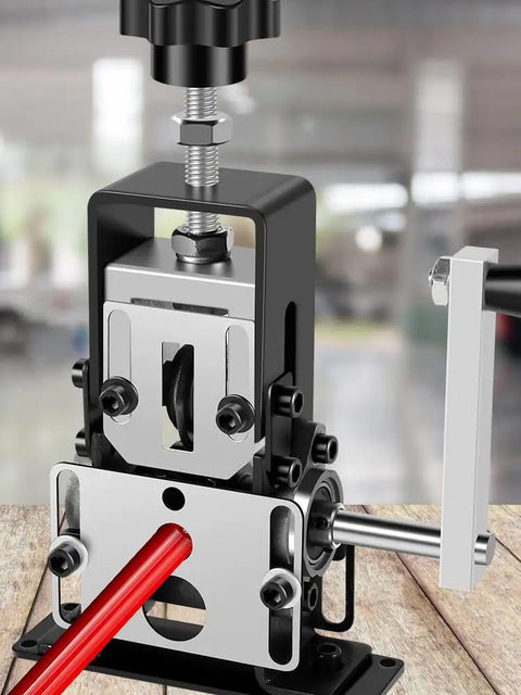 Fast Copper Wire Stripping Tool for 0.06 to 0.98 inch wires with hand crank or drill power, shown stripping a red wire