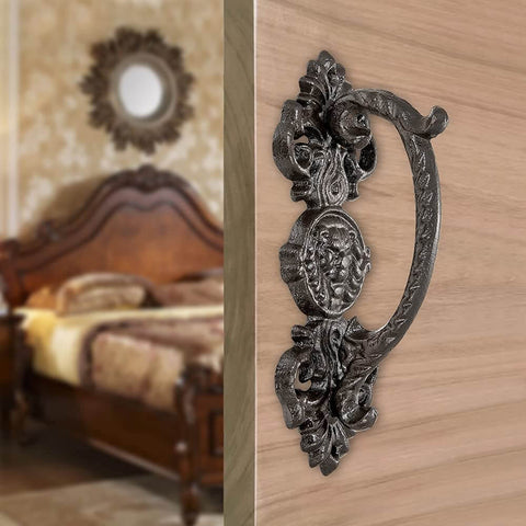 Heavy Duty 2 Pack 5.46 Inch Dark Brown Cast Iron Barn Door Handles Rustic Vintage Gate Fence Outdoor Garage Closet Cabinet Drawer Pulls Sturdy Rust Resistant Long Lasting With Retro Charm on a wooden door with a vintage bedroom setting.