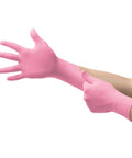 Person wearing Microtouch NitraFree Nitrile Gloves Medium 100 Per Box For Tough Puncture And Chemical Protection