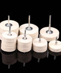 Set of 2 Inch Compressed Wool Fabric Disc Grinder For Jewelry Polishing and Carving with metal shafts on a dark background.