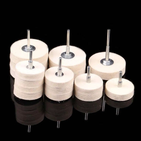 Set of 2 Inch Compressed Wool Fabric Disc Grinder For Jewelry Polishing and Carving with metal shafts on a dark background.