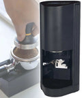 Knockout Quality Automatic Electric Coffee Tamper With 58 Mm Steel Footplate and Digital Touch Panel in use with portafilter.