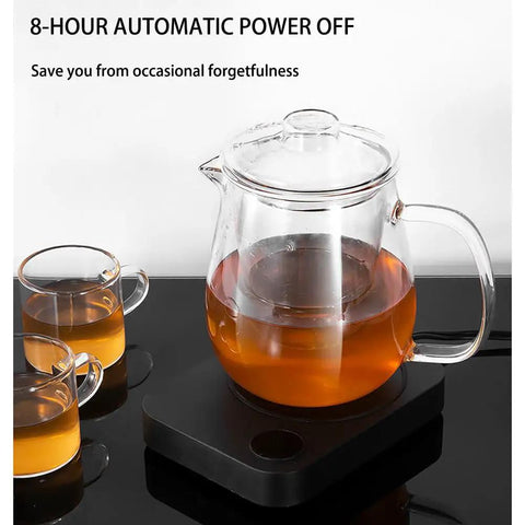 Smart Desk Mug Warmer With Three Adjustable Heat Modes And Built In Safety Timer For Auto Shut Off with glass teapot and cups.