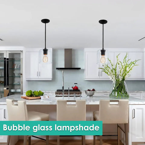Four Pack Clear Seeded Glass Shades For Pendant Lights And Chandeliers hanging over modern kitchen island, 5.12 inches tall