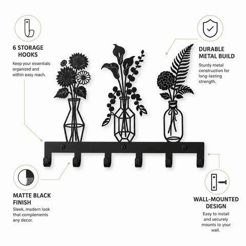 Knockout Premium Decorative Floral Metal Wall Coat Rack Featuring Six Heavy Duty Hooks And Matte Black Finish displayed with hooks and floral design.