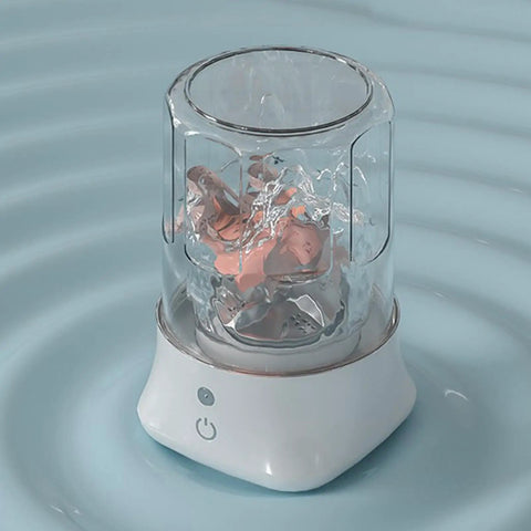 Portable Underwear Washer Mini Compact Laundry Device Built In Rechargeable Battery with water swirling inside.