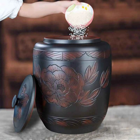 Ceramic Rice Dispenser With Heavy Duty Snap Lid Airtight Bulk Food Storage Container used to pour rice.