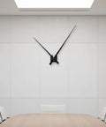 Upgrade Your Home With Top Tier XLWLLNJ Clock Movement Electronic Timekeeping Mechanism For DIY Restoration Projects Including Shaft Mounting Hardware Suitable For Living Room Classroom Studio Color Options Up To 2 With 18MM Shafts - Black clock on white wall above wooden table.