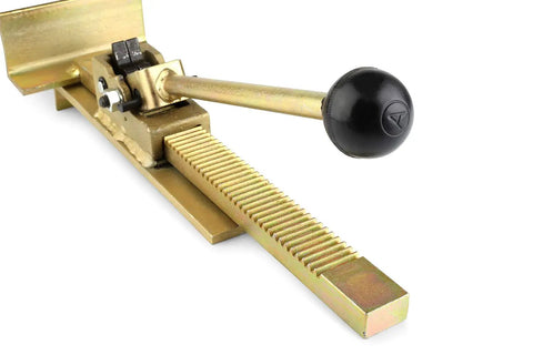 Pro Hardwood Flooring Jack And Positioning Tool with ratcheting system and handle, gold metal, close-up view.