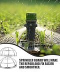 Heavy Duty Stainless Steel Sprinkler Head Protectors with water spraying from a garden sprinkler in a green field.