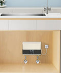 Slick 4000W Tankless Mini Electric Water Heater Featuring Constant Temperature Technology And Convenient Wireless Remote Control Plus Badass Abs Design For Quick Daily Use mounted under kitchen sink with touch panel.