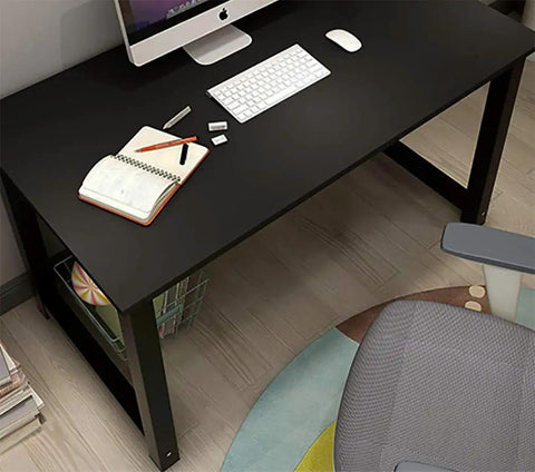 Desk surface covered with Ultra Slick Black Peel And Stick Wallpaper Self Adhesive Vinyl for a modern, sleek look.