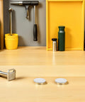 2 Pack Fire Sprinkler Cover Plates Flush Ceiling Finish No Fuss Snap Install Winter Guard on wooden table with tools.