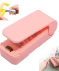 Slick Handheld Mini Bag Sealer And Quick Cutter Portable Heat Resealer Machine For Food Storage and Snack Packing, pink color.
