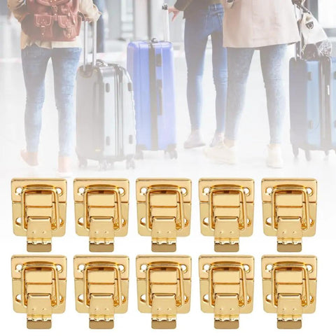 Old School Toggle Hasp Latches Set Gold Tone Metal Buckle Locks 28x40mm shown with travelers and luggage background