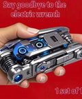 Hand holding 16 In 1 Bicycle Multitool With Tire Levers And Spoke Wrench, Durable Chrome Vanadium Bike Repair Tool Kit, red background